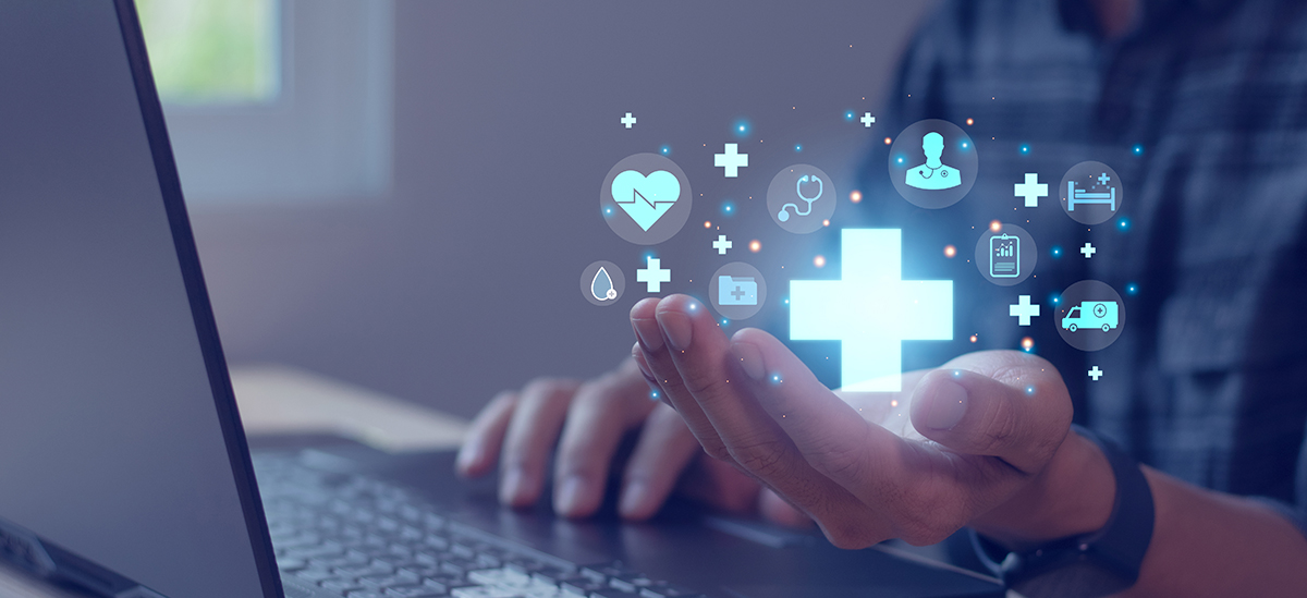 Businessman holding medical icon for health insurance concept in