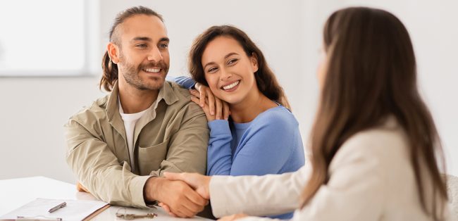 Portrait Of Millennial Couple Buying New Apartment